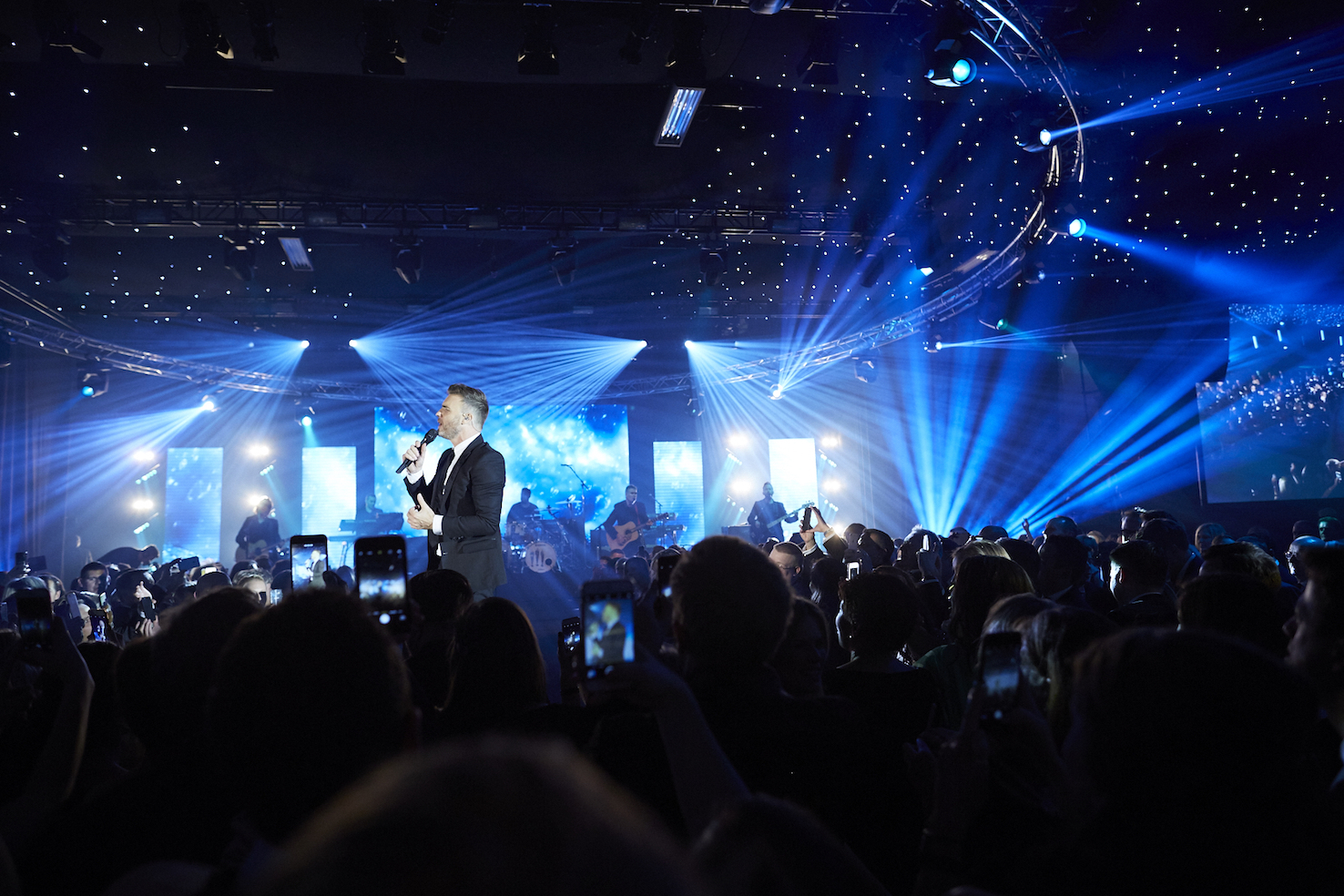 Gary Barlow singing at Evolution London Parties