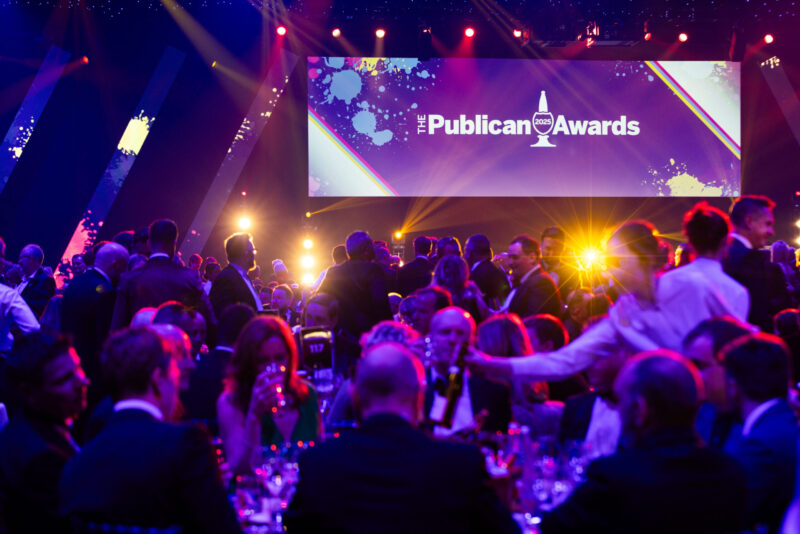 Guests seated at dinner tables with the text The Publican Awards