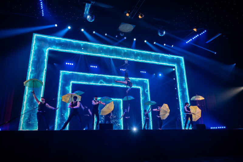 Photograph of dancers on stage at Evolution London